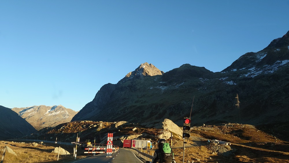 A red light on a mountain road